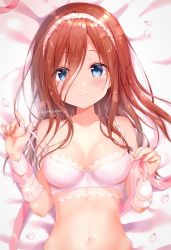 Rule 34 | 1girl, amedamacon, bare shoulders, bed sheet, blue eyes, blush, bow, bow bra, bra, breasts, brown hair, closed mouth, collarbone, commentary request, fingernails, go-toubun no hanayome, hair between eyes, hands up, highres, long hair, lying, medium breasts, nakano miku, navel, on back, petals, pink ribbon, pulled by self, ribbon, smile, solo, strap pull, twitter username, underwear, underwear only, upper body, white bra, wrist cuffs