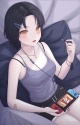 Rule 34 | 1girl, absurdres, bad id, bad twitter id, bandaid, bare arms, bare shoulders, black hair, black shorts, bra strap, breasts, camisole, collarbone, commentary request, dolphin shorts, earphones, earphones removed, forehead, game console, grey shirt, hair ornament, hairclip, highres, holding, kongsi, korean commentary, lace trim, looking at viewer, medium breasts, nintendo switch, open mouth, orange eyes, original, parted bangs, pillow, shirt, short hair, short shorts, shorts, sitting, sleeveless, sleeveless shirt, solo, spaghetti strap