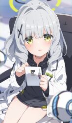 1girl ball bare_legs blue_archive blurry blurry_background blush cellphone chair grey_hair hair_between_eyes hair_ornament halo hare_(blue_archive) highres jacket long_hair looking_at_viewer mochigome_(ununquadium) open_mouth phone pov sitting solo x_hair_ornament