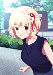 Rule 34 | 1girl, bare shoulders, blonde hair, blue shirt, blue skirt, blurry, blurry background, breasts, commentary request, day, depth of field, hair between eyes, hair ribbon, looking at viewer, lycoris recoil, nishikigi chisato, outdoors, red eyes, red ribbon, ribbon, shirt, skirt, sleeveless, sleeveless shirt, small breasts, smile, solo, tree, yutsuki warabi