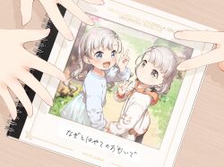 Rule 34 | 2girls, aged down, asymmetrical bangs, blush, braid, braided bangs, commentary request, cover, cover page, grey hair, highres, hisakawa hayate, hisakawa nagi, holding hands, idolmaster, idolmaster cinderella girls, long hair, looking at viewer, multiple girls, photo (object), photo album, short twintails, siblings, sisters, smile, translated, twins, twintails, v, very long hair, yukie (kusaka shi)