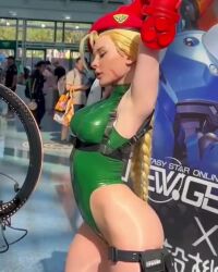 Rule 34 | 1girl, animated, ass, bare legs, bare shoulders, blonde hair, bodypaint, braid, breasts, cammy white, cammy white (cosplay), cosplay, covered navel, curvy, day, fingerless gloves, garrison cap, gloves, green leotard, hat, highleg, highleg leotard, jenna lynn meowri, large breasts, leggings, leotard, lips, long hair, looking at another, lowres, multiple boys, multiple girls, photo (medium), real life, red gloves, shiny skin, skindentation, smile, sound, spandex, street fighter, stretching, thong leotard, twin braids, very long hair, video, wide hips
