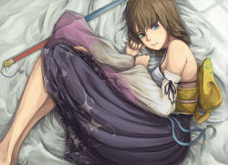 Rule 34 | 00s, 1girl, bare legs, bare shoulders, blue eyes, brown hair, detached sleeves, dress, female focus, final fantasy, final fantasy x, from above, green eyes, hakama, hakama skirt, heterochromia, japanese clothes, kimono, looking at viewer, lying, on bed, on side, ripu (vincecarter), short hair, skirt, solo, staff, wide sleeves, yuna, yuna (ff10)