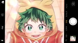 Rule 34 | 1boy, aged down, blush, boku no hero academia, character hood, child, commentary request, freckles, green eyes, green hair, hood, hood up, looking at viewer, male focus, midoriya izuku, morino (ktdk 0141), open mouth, selfie, short hair, smile, solo, user interface