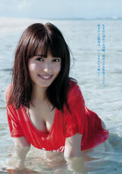Rule 34 | 1girl, aida rikako, highres, looking at viewer, on water, outdoors, photo (medium), red shirt, shirt, smile, voice actor, water