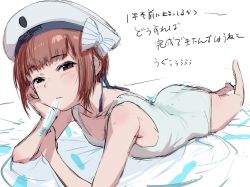 Rule 34 | 1girl, black eyes, bouen, brown hair, clothes writing, hat, highres, kantai collection, lying, mouth hold, on stomach, one-piece swimsuit, peaked cap, sailor hat, school swimsuit, short hair, solo, swimsuit, translation request, white hat, white one-piece swimsuit, z3 max schultz (kancolle)