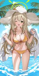 Rule 34 | 1girl, absurdres, bikini, blonde hair, blue archive, blue sky, breasts, cleavage, cloud, collarbone, commentary, day, front-tie bikini top, front-tie top, green eyes, green halo, halo, halterneck, hands up, hat, highres, holding, holding towel, long hair, looking at viewer, medium breasts, navel, nonomi (blue archive), nonomi (swimsuit) (blue archive), ocean, official alternate costume, one eye closed, open mouth, outdoors, palm tree, ratto (ratto channel), side-tie bikini bottom, sky, smile, solo, standing, string bikini, sun hat, swimsuit, towel, tree, wading, white hat, yellow bikini