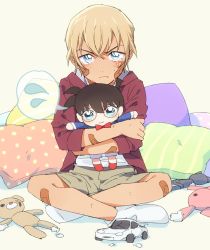Rule 34 | 1boy, aged down, amuro tooru, bandaid, bandaid on arm, bandaid on cheek, bandaid on face, bandaid on leg, blonde hair, blue eyes, broken, brown shorts, character doll, child, closed mouth, commentary request, crying, crying with eyes open, edogawa conan, frown, hair between eyes, hood, hoodie, hugging doll, hugging object, indian style, k (gear labo), looking at viewer, male focus, meitantei conan, no shoes, on bed, open clothes, open hoodie, pillow, red hoodie, shirt, short hair, shorts, simple background, sitting, socks, solo, speech bubble, spoken sweatdrop, stuffed animal, stuffed toy, sweatdrop, tears, teddy bear, toy car, v-shaped eyebrows, white background, white shirt, white socks