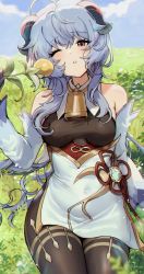 Rule 34 | ahoge, bare shoulders, bell, black legwear, blue hair, blush, breasts, chinese knot, detached sleeves, flower, flower knot, ganyu (genshin impact), genshin impact, gold trim, grass, highres, holding, holding flower, horns, long hair, looking at viewer, medium breasts, neck bell, oh (aung ae), one eye closed, open mouth, outdoors, purple eyes, sidelocks, sitting, solo, sweet flower, thighlet, vision (genshin impact), white sleeves