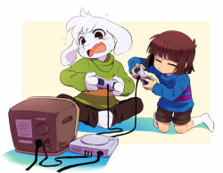 Rule 34 | 1boy, 1other, asriel dreemurr, bano akira, blue sweater, blush, brown pants, brown shorts, fang, frisk (undertale), game console, green sweater, no shoes, open mouth, pants, playing games, playstation 1, playstation controller, shorts, simple background, sitting, socks, striped clothes, striped sweater, sweat, sweater, television, undertale, white background, white socks