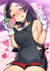 Rule 34 | 1girl, ;), ;p, apron, bare arms, bare shoulders, bed sheet, bike shorts, black apron, black hair, black shorts, blue choker, blue ribbon, blush, box, breasts, choker, commentary request, cowboy shot, forehead, gloves, hair ornament, hairclip, hands up, heart, heart-shaped box, highres, holding, holding box, kantai collection, kuroshio (kancolle), looking at viewer, lying, nose blush, on back, one eye closed, ribbon, ribbon choker, short hair, short shorts, shorts, small breasts, smile, solo, taketora suzume, tongue, tongue out, w, white gloves, yellow eyes