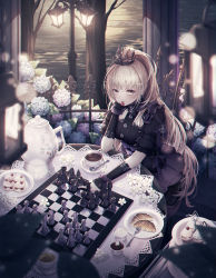 Rule 34 | 1girl, absurdres, black dress, black gloves, blurry, blush, board game, breasts, brown eyes, cecil86, cherry, chess, chessboard, cuffs, cup, cupcake, depth of field, dress, fingerless gloves, flower, food, fruit, gloves, hand on own cheek, hand on own face, highres, hydrangea, lantern, leaf, light brown hair, long hair, looking at viewer, medium breasts, mouth hold, original, plate, saucer, sitting, solo, table, teacup, teapot, tiara, water