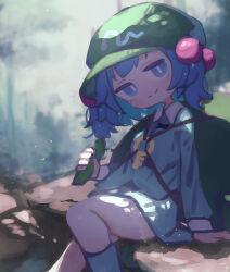 Rule 34 | 1girl, backpack, bag, blue eyes, blue footwear, blue hair, blue shirt, blue skirt, blush, chii (tsumami tsumamare), closed mouth, cucumber, day, flat cap, food, green hat, hair bobbles, hair ornament, hat, highres, holding, holding food, holding vegetable, kawashiro nitori, key, long sleeves, medium hair, outdoors, shirt, sitting, skirt, smile, solo, touhou, two side up, vegetable