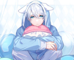 1boy animal_ears animal_hood blue_eyes blue_hoodie blue_theme blush closed_mouth curtains diamond_(shape) fake_animal_ears feet_out_of_frame fingernails frown habatatsuki hair_between_eyes highres hood hood_up hoodie knees_up long_sleeves looking_afar male_focus hugging_object original pajamas pants pillow pillow_hug see-through_clothes short_hair sitting solo swept_bangs white_hair white_pants