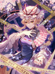 Rule 34 | 1girl, arrow (symbol), black nails, blonde hair, caution tape, cherry blossoms, closed mouth, commentary request, cowboy shot, dress, fingernails, flower, frilled sleeves, frills, hair between eyes, hand fan, hand up, hat, hat ribbon, highres, holding, holding fan, keep out, light smile, long hair, long sleeves, looking at viewer, magic, mob cap, nail polish, natsume k, outstretched hand, pink flower, purple tabard, red ribbon, ribbon, solo, tabard, touhou, twitter username, watermark, white dress, white hat, yakumo yukari, yellow eyes
