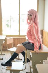 Rule 34 | 1girl, asian, black socks, bocchi the rock!, chair, chinese (nationality), chunmomo0127, classroom, cosplay, cosplay photo, desk, gotoh hitori, highres, indoors, jacket, long hair, looking at viewer, on desk, photo (medium), pink hair, pink jacket, real life, shoes, sitting, on desk, skirt, socks, wig, window
