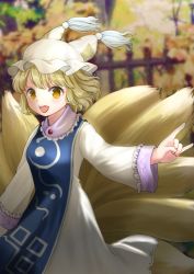 Rule 34 | 1girl, animal hat, blonde hair, blue tabard, breasts, commentary request, dress, fox shadow puppet, fox tail, hat, highres, kyabekko, long sleeves, medium breasts, mob cap, multiple tails, open mouth, outdoors, short hair, solo, tabard, tail, tassel, touhou, white dress, white hat, wide sleeves, yakumo ran, yellow eyes, yellow tail
