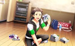 Rule 34 | 1boy, bag, black hair, bottle, crossed legs, fingerless gloves, fingernails, full body, gloves, highres, holding, holding manga, idolmaster, idolmaster side-m, idolmaster side-m live on stage!, indoors, kimura ryu, looking at viewer, male focus, manga (object), microphone, official art, on floor, open mouth, shoes, short sleeves, sneakers, teeth, third-party source, upper teeth only, water bottle, wooden floor, wristband
