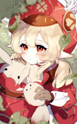 Rule 34 | 1girl, absurdres, ahoge, blurry, brown gloves, brown scarf, cabbie hat, child, clover print, coat, commentary request, depth of field, dodoco (genshin impact), genshin impact, gloves, hair between eyes, hat, hat feather, hat ornament, highres, hugging doll, hugging object, jumpy dumpty, kise inaka, klee (genshin impact), light brown hair, long hair, long sleeves, low twintails, orange eyes, pocket, pointy ears, red coat, red hat, scarf, sidelocks, solo, stuffed animal, stuffed toy, twintails