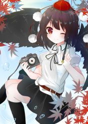 Rule 34 | 1girl, autumn leaves, bird wings, black hair, black ribbon, black skirt, black socks, black wings, blush, bubble, camera, closed mouth, collared shirt, doko ka no hosono, feet out of frame, hat, highres, holding, holding camera, holding pen, kneehighs, leaf, looking at viewer, medium hair, neck ribbon, nib pen (object), pen, pom pom (clothes), red eyes, ribbon, shameimaru aya, shirt, skirt, smile, socks, solo, split mouth, tokin hat, touhou, white shirt, wings