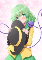 Rule 34 | 1girl, ahoge, blush, commentary request, cowboy shot, floral print, frilled shirt collar, frilled sleeves, frills, gradient background, green eyes, green hair, green skirt, hair between eyes, hat, unworn hat, head tilt, unworn headwear, highres, holding, holding clothes, holding hat, komeiji koishi, long sleeves, looking at viewer, pink background, rose print, shirt, short hair, skirt, solo, standing, tareme, teoi (good chaos), third eye, touhou, untucked shirt, wavy mouth, wide sleeves, yellow shirt
