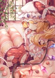 Rule 34 | 1girl, adapted costume, back cutout, blonde hair, clothing cutout, couch, crystal, flandre scarlet, food, frills, hair between eyes, hand up, hat, highres, holding, holding food, indoors, knees up, looking back, macaron, midriff, mob cap, one eye closed, one side up, pink thighhighs, polka dot, red eyes, red shirt, red skirt, sekisei (superego51), shirt, short hair, short hair with long locks, sitting, skirt, solo, thighhighs, touhou, window, wings