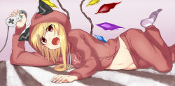 Rule 34 | 1girl, :o, animal hood, blonde hair, blush, cable, carpet, cat hood, clothes writing, controller, crystal, demon wings, dirty socks, fang, flandre scarlet, game controller, groin, hati105, holding, hood, hoodie, leg up, long sleeves, lying, navel, on side, open mouth, pants, purple background, red eyes, red pants, simple background, socks, solo, stomach, tooth, touhou, white socks, wings