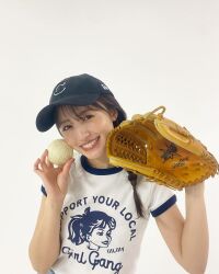 Rule 34 | 1girl, aida rikako, baseball glove, highres, indoors, looking at viewer, photo (medium), smile, standing, voice actor