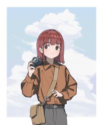 Rule 34 | 1girl, absurdres, bad id, bad pixiv id, bag, blue sky, border, breasts, brown eyes, camera, closed mouth, cloud, collared shirt, commentary, grey pants, hand up, highres, holding, holding camera, kenharu, light smile, ligne claire, long sleeves, medium hair, orange shirt, original, pants, red hair, satchel, shirt, sky, solo, white border