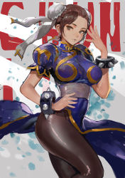 Rule 34 | 1girl, blue dress, bracelet, breasts, brown eyes, brown hair, brown pantyhose, bun cover, canking, capcom, character name, china dress, chinese clothes, chun-li, dress, expressionless, jewelry, large breasts, pantyhose, puffy short sleeves, puffy sleeves, sash, short hair, short sleeves, solo, spiked bracelet, spikes, standing, street fighter