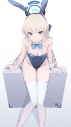Rule 34 | 1girl, animal ears, bare shoulders, blonde hair, blue archive, blue bow, blue bowtie, blue eyes, blue leotard, blush, bow, bowtie, breasts, cleavage, closed mouth, collarbone, covered navel, detached collar, dot nose, expressionless, fake animal ears, feet out of frame, from above, full body, groin, hair bow, halo, highleg, highleg leotard, highres, knees together feet apart, leotard, long hair, looking at viewer, medium breasts, official alternate costume, playboy bunny, rabbit ears, rafrog, sidelocks, simple background, sitting, skindentation, solo, strapless, strapless leotard, thigh gap, thighhighs, thighs, toki (blue archive), toki (bunny) (blue archive), tsurime, very long hair, white background, white thighhighs, wrist cuffs