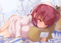 Rule 34 | 1girl, bathrobe, berotore, blush, box, breasts, card, closed mouth, full body, gift, gift box, heterochromia, highres, holding, holding card, hololive, houshou marine, large breasts, long hair, looking at object, lying, on stomach, red eyes, red hair, smile, solo, twisted torso, virtual youtuber, white day, yellow eyes