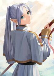 Rule 34 | 1girl, absurdres, capelet, dangle earrings, earrings, elf, frieren, from behind, green eyes, grey hair, highres, holding, holding staff, jewelry, long hair, looking at viewer, looking back, mage staff, nemo ringo, pointy ears, skirt, solo, sousou no frieren, staff, white capelet, white skirt