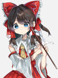 Rule 34 | 1girl, ascot, bare shoulders, blue eyes, bow, brown hair, collared vest, commentary request, detached sleeves, frilled bow, frilled hair tubes, frills, gohei, hair bow, hair tubes, hakurei reimu, highres, holding, long sleeves, looking at viewer, medium hair, ponytail, ramochi, red bow, red skirt, red vest, sidelocks, skirt, solo, touhou, vest, wide sleeves, yellow ascot