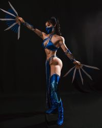Rule 34 | 1girl, abs, arm up, armpits, black background, black eyes, black hair, boots, breasts, chinese (nationality), cleavage, cosplay, cosplay photo, fang, fangs, female focus, full body, highres, holding, holding weapon, kitana, kitana (cosplay), legs apart, long hair, looking at viewer, lothes, mask, medium breasts, midriff, model, mortal kombat (series), mouth mask, muscular, muscular arms, muscular female, muscular legs, navel, pectorals, pelvic curtain, photo (medium), ponytail, simple background, solo, standing, thigh boots, war fan, weapon, yuan herong