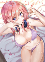 Rule 34 | 1girl, absurdres, bare shoulders, bed sheet, blue eyes, blush, bra, breasts, cleavage, closed mouth, collarbone, eyelashes, from above, go-toubun no hanayome, groin, hair between eyes, headphones, headphones around neck, highres, knees up, large breasts, long hair, looking at viewer, lying, nakano miku, navel, on back, on bed, panties, petals, pink hair, purple bra, purple panties, side-tie panties, sidelocks, solo, stomach, sunhyun, underwear, underwear only, untied panties
