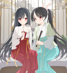 Rule 34 | 2girls, absurdres, black hair, blue hakama, chinese zodiac, closed mouth, feet out of frame, folded fan, folding fan, hakama, hakama skirt, hand fan, highres, holding, holding fan, japanese clothes, jyt, kimono, long sleeves, looking at viewer, magnifying glass, multiple girls, original, ponytail, red eyes, red hakama, skirt, white kimono, wide sleeves, year of the rabbit