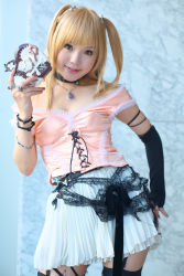 Rule 34 | 1girl, amane misa, amane misa (cosplay), asian, bare shoulders, blonde hair, breasts, choker, cleavage, cosplay, cross, death note, fingerless gloves, garter straps, gloves, hair ornament, highres, indoors, jewelry, kipi-san, long hair, looking at viewer, miniskirt, mole, pendant, photo (medium), ring, single glove, skirt, skull and crossbones, skull hair ornament, skull ring, small breasts, smile, solo, thighhighs, two side up, zettai ryouiki