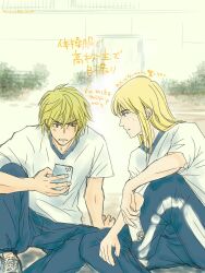 Rule 34 | 2023, 2boys, alternate costume, androgynous, arrow (symbol), bkb chimo, blonde hair, blue eyes, blush, brown eyes, canute, contemporary, dated, eyebrows, eyebrows hidden by hair, highres, holding, holding phone, japanese text, looking at phone, male focus, messy hair, multiple boys, pants, parted lips, phone, profile, shoes, sidelocks, sitting, sweat, teeth, thorfinn, track suit, vinland saga, watermark, web address