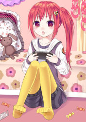 Rule 34 | 1girl, argyle, bed, candy, candy wrapper, feet, floral print, frilled pillow, frills, hair ornament, handheld game console, heart, heart hair ornament, ikeda yuuki, long hair, md5 mismatch, no shoes, original, pantyhose, pillow, playing games, playstation vita, red eyes, red hair, shorts, side ponytail, sitting, solo, wrapped candy, yellow pantyhose