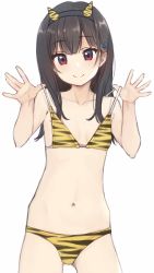 1girl, animal print, bangs, bare arms, bare shoulders, bikini, bikini lift, black hair, black hairband, closed mouth, collarbone, commentary request, eyebrows visible through hair, fake horns, gluteal fold, hair ornament, hairband, highres, horns, lifted by self, long hair, looking at viewer, nagami yuu, navel, original, print bikini, red eyes, simple background, smile, solo, standing, swimsuit, tiger print, white background, yellow bikini