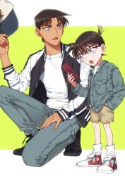 Rule 34 | 2boys, baseball cap, black-framed eyewear, black footwear, blue eyes, blue jacket, brown hair, brown shorts, buttons, casual, cellphone, child, commentary request, dark-skinned male, dark skin, denim, denim jacket, edogawa conan, glasses, green background, grey pants, hand in pocket, hat, hattori heiji, highres, holding, holding clothes, holding hat, holding phone, jacket, k (gear labo), letterman jacket, long sleeves, looking at another, male focus, meitantei conan, multiple boys, on one knee, open clothes, open jacket, open mouth, pants, phone, serious, shirt, shoes, short hair, shorts, sneakers, socks, standing, two-tone background, unworn hat, unworn headwear, v-shaped eyebrows, white background, white legwear, white shirt