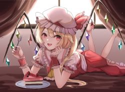 Rule 34 | 1girl, :d, ascot, barefoot, blonde hair, cake, cake slice, crystal, curtains, erisauria, feet, flandre scarlet, food, full body, hat, hat ribbon, highres, indoors, legs up, looking at viewer, lying, mob cap, on stomach, one side up, open mouth, plate, red eyes, red ribbon, ribbon, short sleeves, smile, solo, touhou, white hat, window, wings, wrist cuffs, yellow ascot