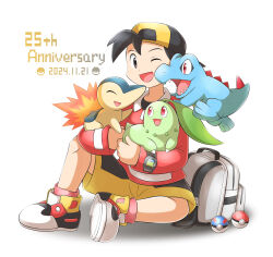 1boy ;d absurdres anniversary aogaeru_(pixiv46613656) backwards_hat black_hat chikorita commentary_request creatures_(company) cyndaquil dated ethan_(pokemon) game_freak gen_2_pokemon great_ball grey_bag happy hat highres holding holding_pokemon jacket long_sleeves male_focus nintendo one_eye_closed open_mouth pink_socks poke_ball poke_ball_(basic) pokemon pokemon_(creature) pokemon_gsc shoes shorts smile socks starter_pokemon_trio totodile yellow_shorts